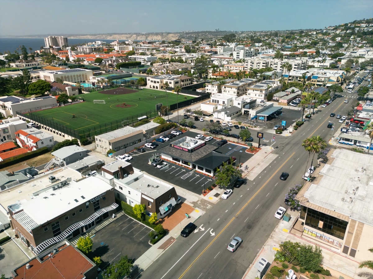 Aerial view of El Pueblo La Jolla from above, parking lot and surroundings